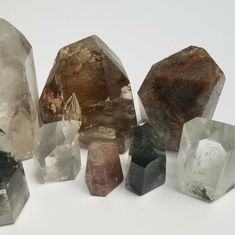 Polished Included Quartz Crystal Point